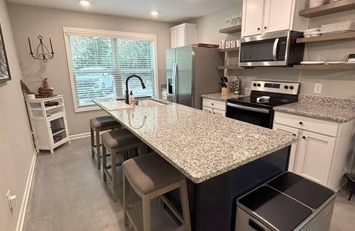 Rabun Gap House | Modern, 3/2 bed with fireplace, screened porch, & outdoor seating area.