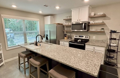 Rabun Gap House | Modern, 3/2 bed with fireplace, screened porch, & outdoor seating area.