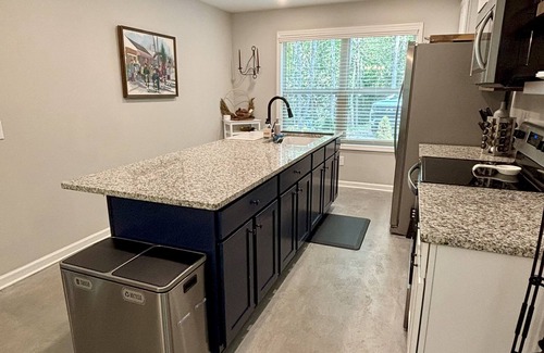 Rabun Gap House | Modern, 3/2 bed with fireplace, screened porch, & outdoor seating area.