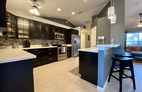 San Carlos Park House | Modern 3 bedroom, 2 bath getaway with HEATED private pool and jacuzzi