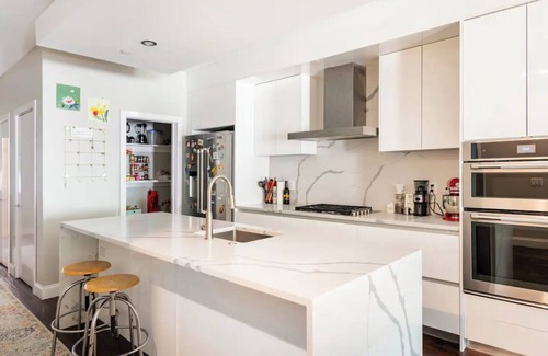 West Poplar Condo | Modern 3-bedroom condo with yard and spa bath in charming Philadelphia
