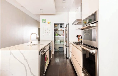 West Poplar Condo | Modern 3-bedroom condo with yard and spa bath in charming Philadelphia