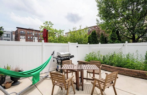 West Poplar Condo | Modern 3-bedroom condo with yard and spa bath in charming Philadelphia