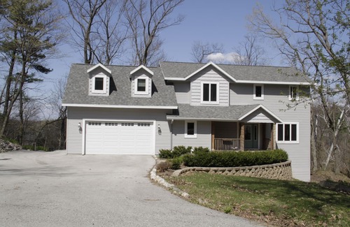Plymouth House | Modern 3-bedroom home in quiet wooded area very close to Elkhart Lake, Wisconsin