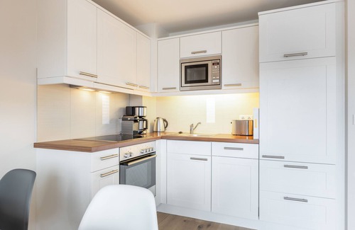Westerland Apartment | Modern 3-room vacation apartment for up to 4 people with balcony.