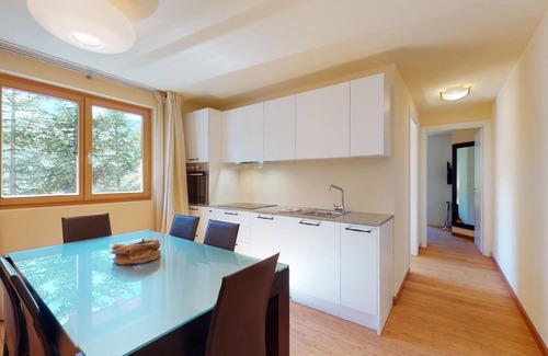 Madulain Apartment | Modern 3½ room flat on the ground floor, approx.