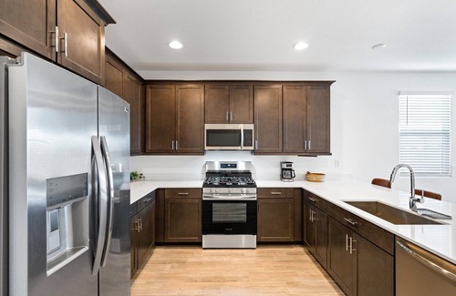 Goodyear House | Modern 3BR/2BA home in Goodyear with a community pool, pickleball courts, and EV charger! Less than a mile from Goodyear baseball stadium and close to other major venues, shopping, and golf courses!