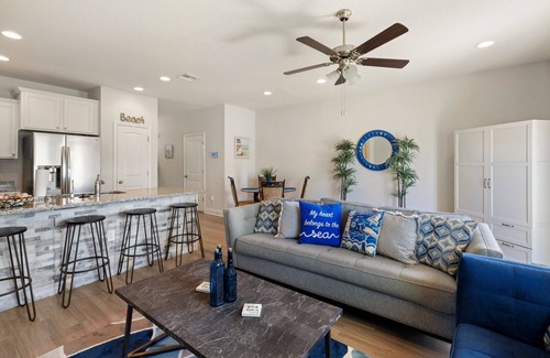 Thomas Drive House | Modern 3BR Townhome | Pool Access | Near Publix Sports Park & Beaches | Sleeps 9