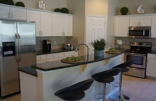 Watersong Villa | Modern 4-Bedroom Villa with Pool, Spa, Game Room & BBQ – 20 Min to Disney