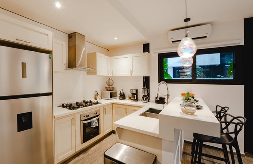 Ek Balam Village House | Modern 4 Bedroom Villa with Rooftop Pool Near Tulum Beach