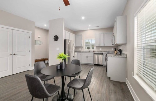 Grandville Apartment | Modern 4BR 4BA Two Unit Condo w Garage and Patio