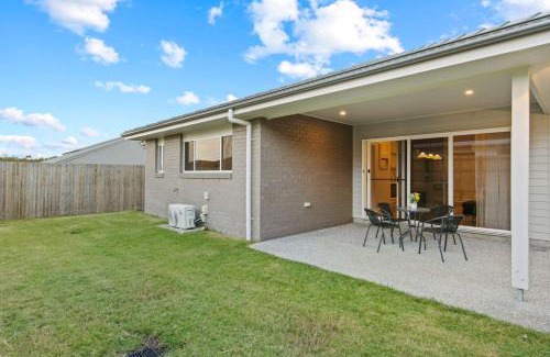 Logan Reserve House | Modern 4BR Home Peaceful Logan Reserve Stay
