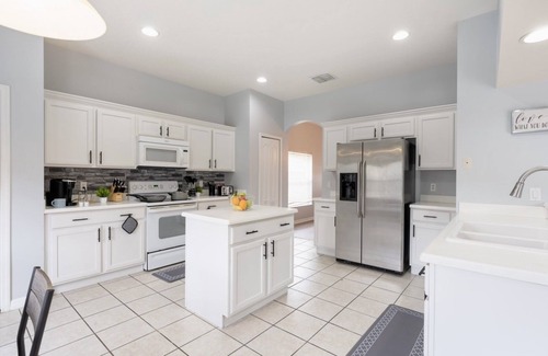 West Haven House | Modern 5BR Family Home w/Private Pool Near Disney