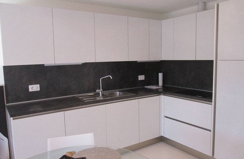 Riva del Garda Apartment | Modern and bright apartment near the lake, WiFi, a/c, garden, garage