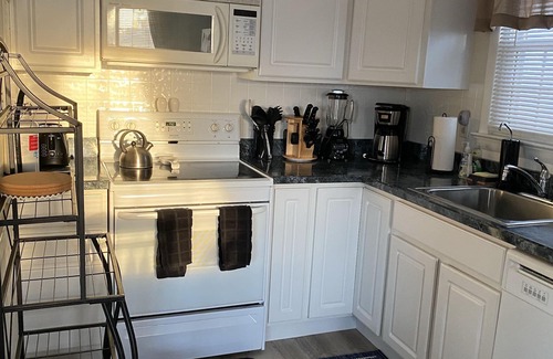South End Condo | Modern and relaxing great location, only 4 homes to the beach, 2 large decks.