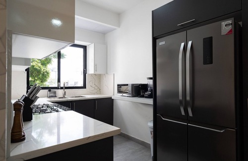 Renacimiento Condo | Modern And Safe In City Center W/Pool By YellowKey
