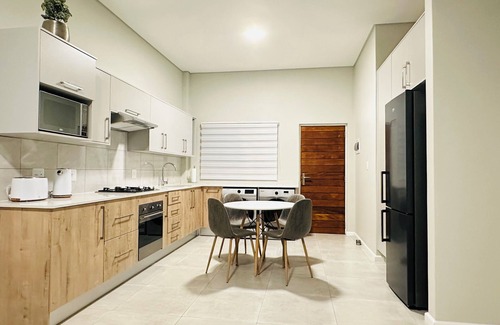 Equestria Apartment | Modern and tranquil apartment nestled near vibrant shopping centre's and malls!