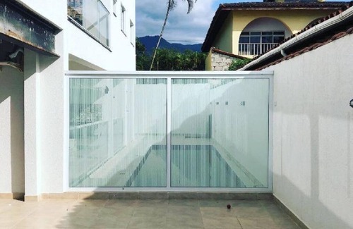 Maranduba House | Modern apartment facing the sea with its own barbecue and swimming pool - Ubatuba