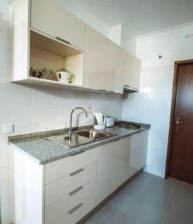 Vale de Seixos Apartment | Modern apartment in Estói with shared pool.