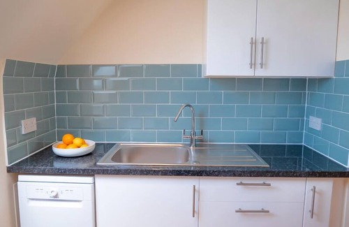 St Sampsons Apartment | Modern apartment in picturesque north Guernsey, by beautiful bay and Vale Castle