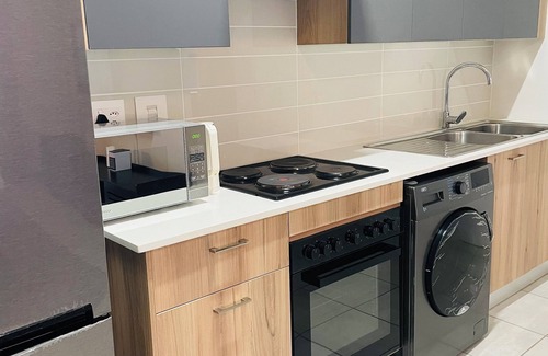 Greater Johannesburg Metropolitan Area Apartment | Modern apartment in Sandton. Located in a secure estate, with balcony views.