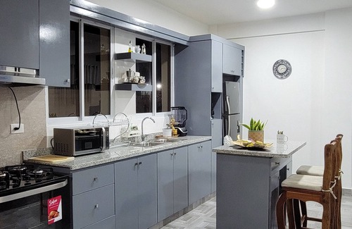 Ensanche Miramar Apartment | Modern apartment, ocean and mountain views