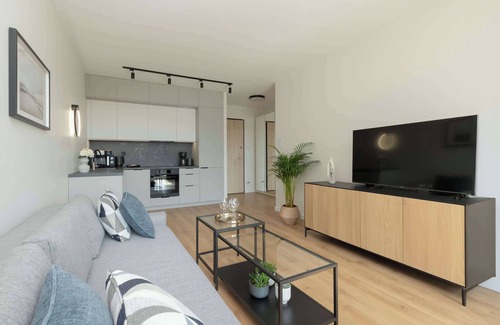 Nowy Port Apartment | Modern Apartment with Parking by Noclegi Renters