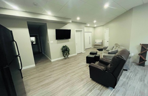 Brandon Apartment | Modern Basement Suite