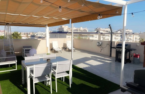 Pueblo Latino Condo | Modern Beach Home + Roof Terrace