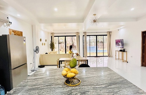 Manukan Villa | Modern beachside oasis w/pool 2bed 2bath villa with AC, WiFi in Manukan.