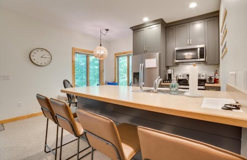 Mancelona Apartment | Modern Bellaire Condo Pool Access, Near Skiing!