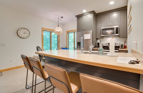 Mancelona Condo | Modern Bellaire Condo: Pool Access, Near Skiing!