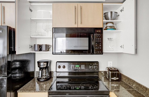Woodmont Triangle Apartment | Modern Bethesda 1BR w/Concierge, Gym, W/D, walk to Metro, by Blueground