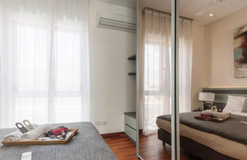 Bedok House | Modern & big private studio room at top floor with shared pool in bungalow