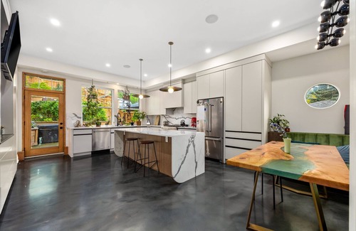 Ramsay House | Modern Brownstone Retreat Near Downtown, Zoo, Saddledome & River Pathways