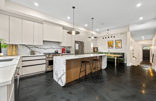 Ramsay House | Modern Brownstone Retreat Near Downtown, Zoo, Saddledome & River Pathways