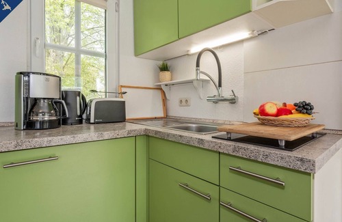 Luetow Apartment | Modern bungalow in Lütow on the Achterwasser with terrace and jetty access