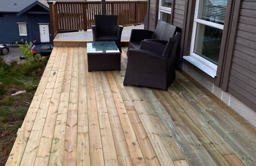 Steinsland Cabin | Modern cabin by the sea with hot tub, sauna and boat rental