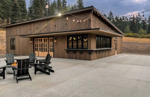 Clancy Cabin | Modern cabin on 10 creek front acres with large gas fire pit.