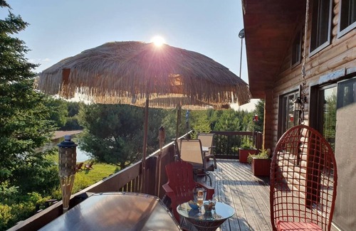 Riviere-Rouge Ski Chalet | Modern Cabin with stunning river views, hot tub