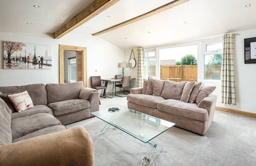 Upton Cheyney Cabin | Modern cabins with gorgeous lounge & sunny deck sleeps 18