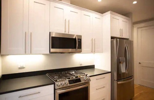 Riverside Apartment | Modern Cambridge oasis with EV parking and yard