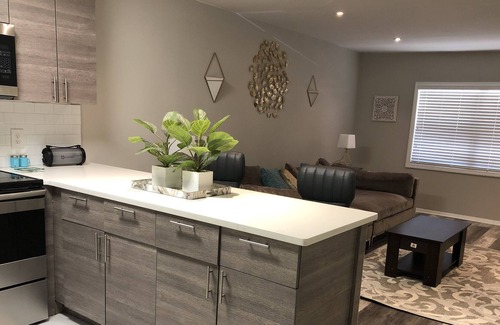 Loring Heights Condo | Modern chic living with a splash of AQUA
