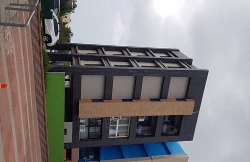 Hengchun Apartment | MODERN CHIC NEW APARTMENT close to great food, beach, A/C, balcony views, wi/fi.