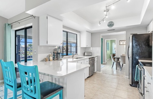 Cape Coral House | Modern Coastal Home w/Heated Pool & Waterfront Views!