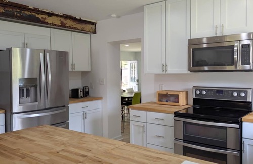 Colonial Beach House | Modern comfort. Bring your boat, walk to the beach. Dog friendly.