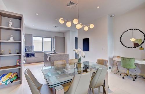 Westwind Condo | Modern condo, steps to beach. Gym, generator, gated community.
