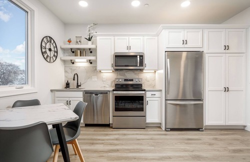 Traverse City Condo | Modern condo with picturesque views- a block from the beach