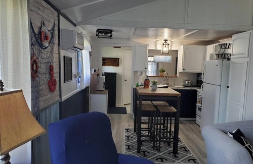 Evart Cottage | Modern cottage with dock and frontage on private lake.