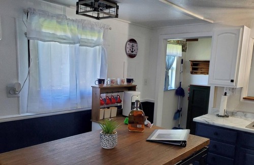 Evart Cottage | Modern cottage with dock and frontage on private lake.